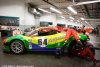 #64 Scuderia Corsa Ferrari 458 in the garage with mechanical issues