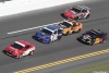 A group of Continental Tire Sports Car Series cars practice on track