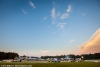 Race action at dusk