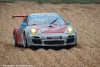 #44 Flying Lizard Motorsports Porsche 911 GT3 Cup: Seth Neiman, Dion von Moltke, Brett Sandberg in the gravel