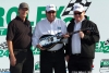 Rolex24 at Daytona 24 hour race
DP victory lane: Chip Ganassi and Felix Sabates receive the winning guitar