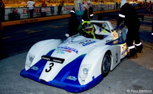 Ready_to_deliver_-_Gavin_Cronje_straps_intot_he_Ligier._Image_-_Paul_Bedford
